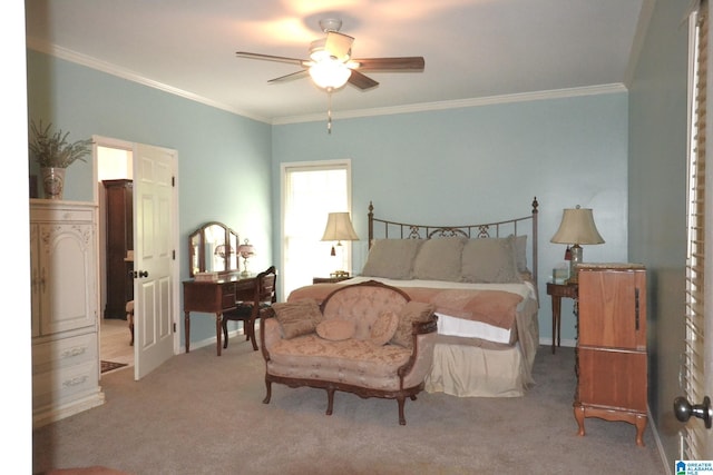 bedroom featuring ornamental molding, light carpet, and ceiling fan