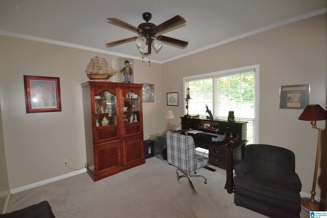 office space featuring crown molding, ceiling fan, and carpet flooring