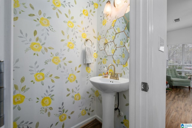 bathroom featuring wood-type flooring