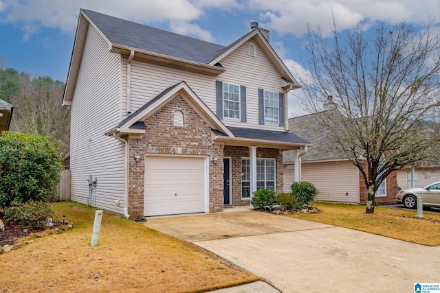 front of property featuring a garage and a front yard