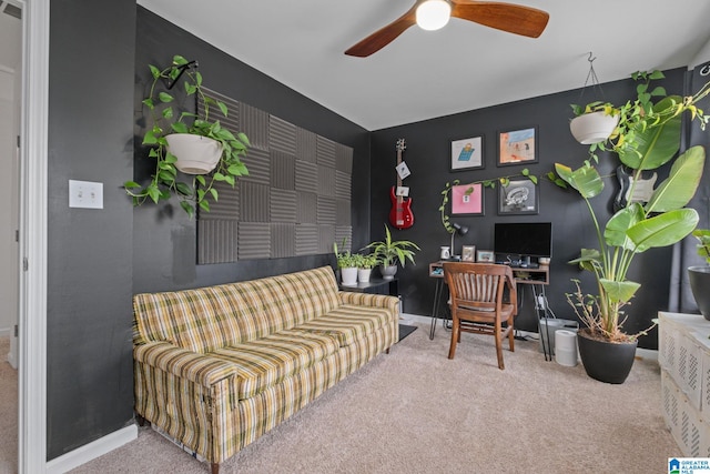 home office featuring ceiling fan and carpet flooring