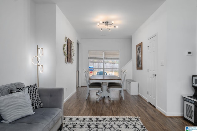 dining space featuring dark hardwood / wood-style floors