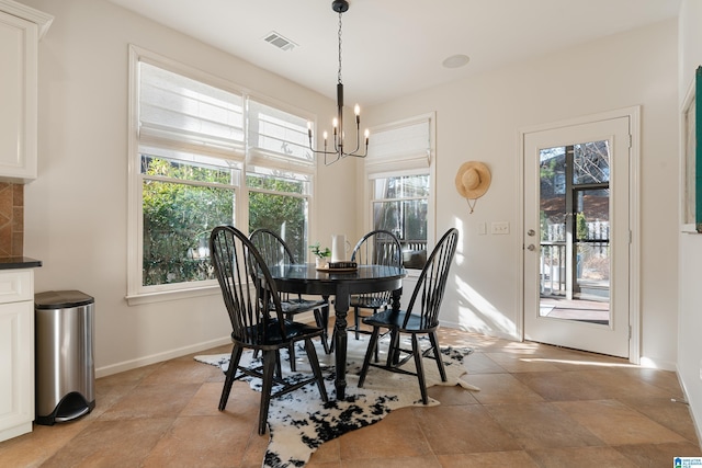 dining room featuring a chandelier