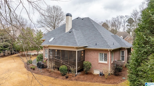 view of property exterior featuring a sunroom