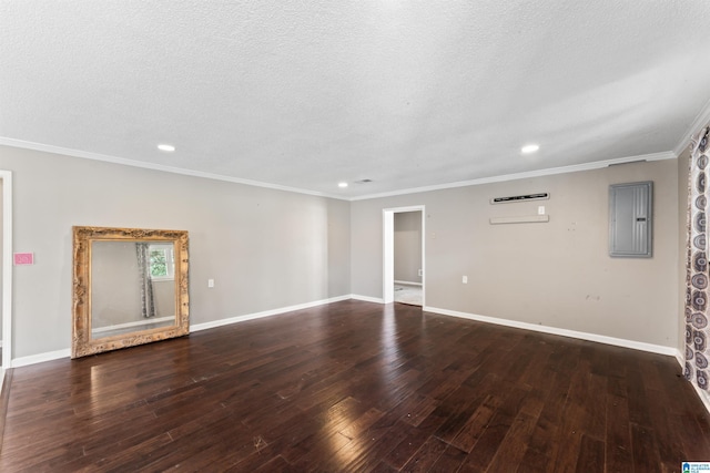 unfurnished room with crown molding, dark hardwood / wood-style floors, electric panel, and a textured ceiling