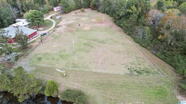 aerial view with a rural view and a water view