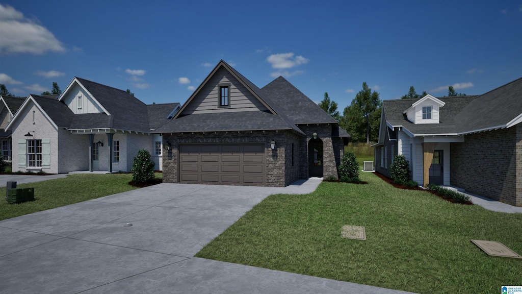 view of front facade with a garage and a front lawn