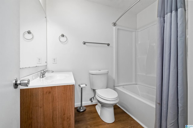 full bathroom featuring shower / tub combo with curtain, vanity, hardwood / wood-style flooring, and toilet