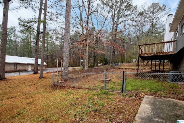 view of yard featuring a wooden deck