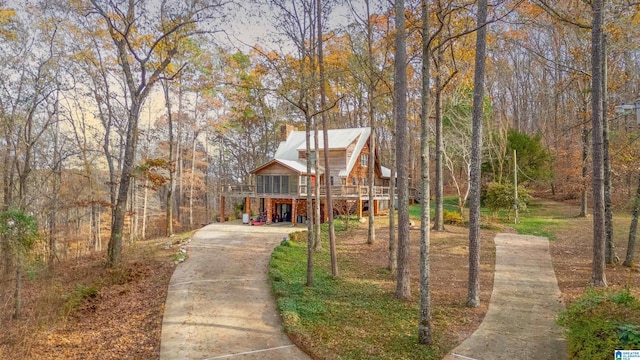 view of front of home with a carport