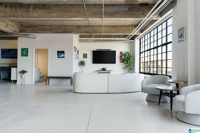 living room with concrete floors