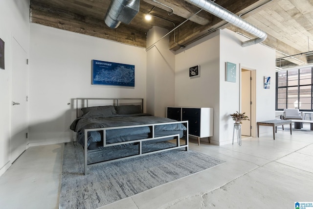 bedroom with concrete flooring