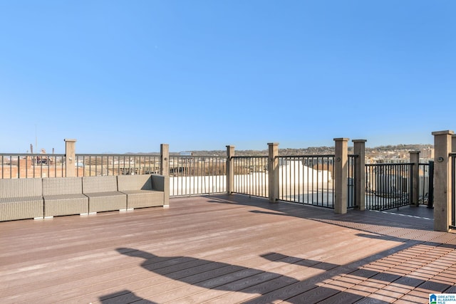 wooden deck with an outdoor hangout area