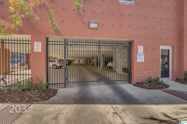 view of gate featuring fence