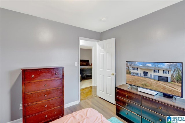 bedroom featuring light hardwood / wood-style floors