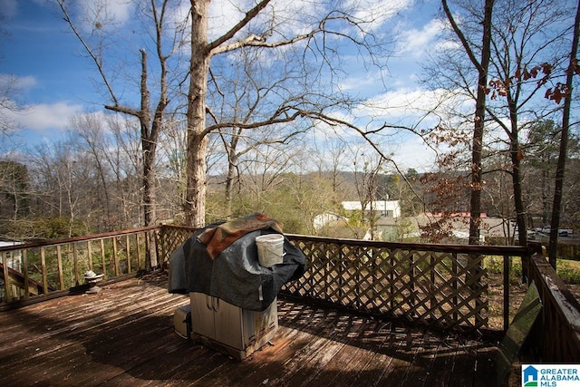 wooden deck with area for grilling