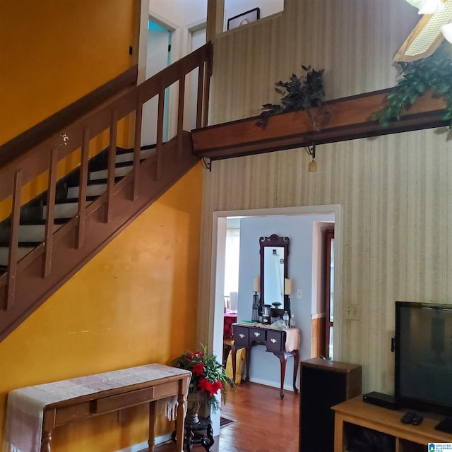 stairway featuring hardwood / wood-style flooring