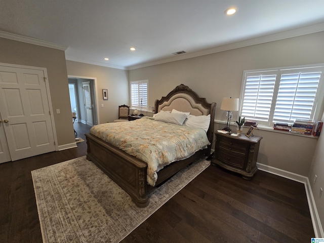 bedroom with crown molding, dark hardwood / wood-style floors, and multiple windows