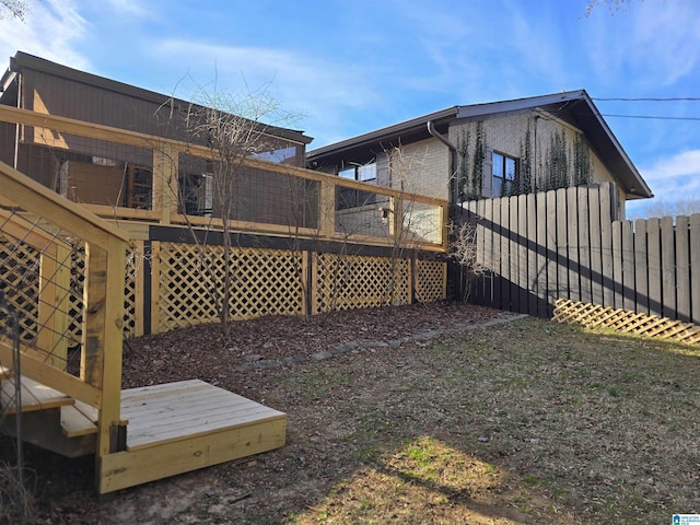 view of yard with a wooden deck