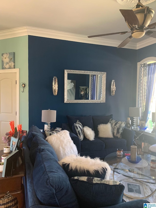 living room featuring ornamental molding and ceiling fan