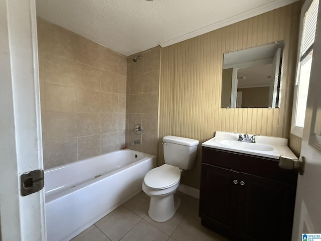 bathroom with vanity, a textured ceiling, tile patterned flooring, and toilet