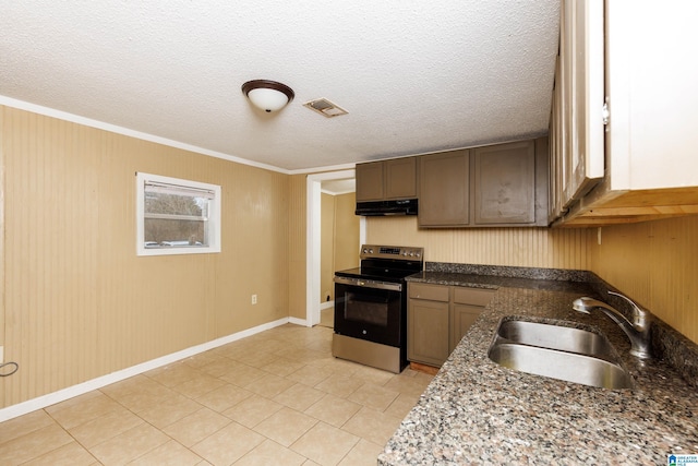 kitchen with a textured ceiling, ornamental molding, sink, stainless steel electric stove, and dark stone countertops