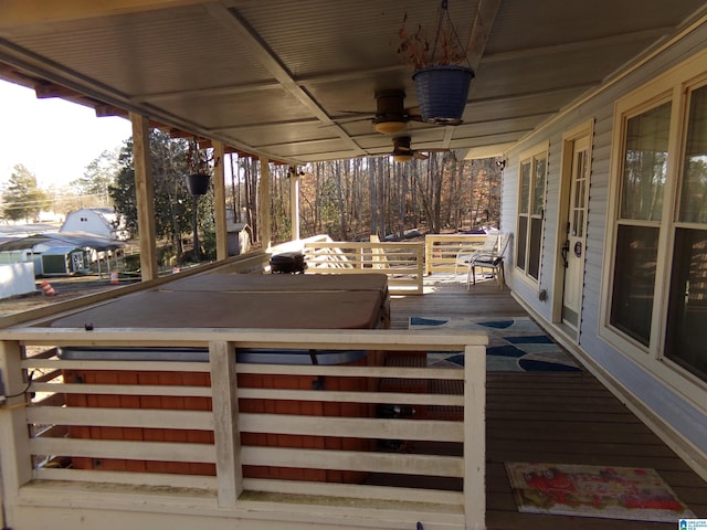 deck with a porch and a ceiling fan