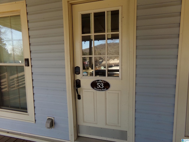 doorway to property featuring a mountain view