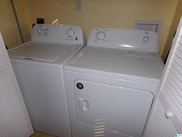 laundry area with laundry area and washing machine and dryer