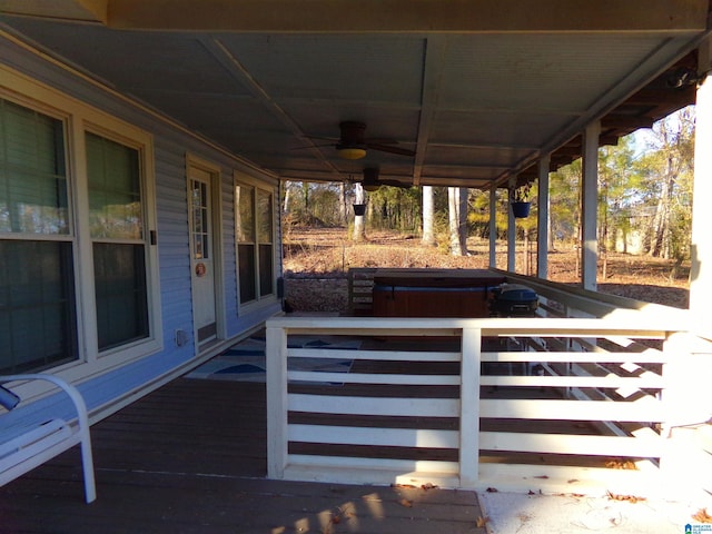 view of patio featuring a carport, a porch, and a ceiling fan