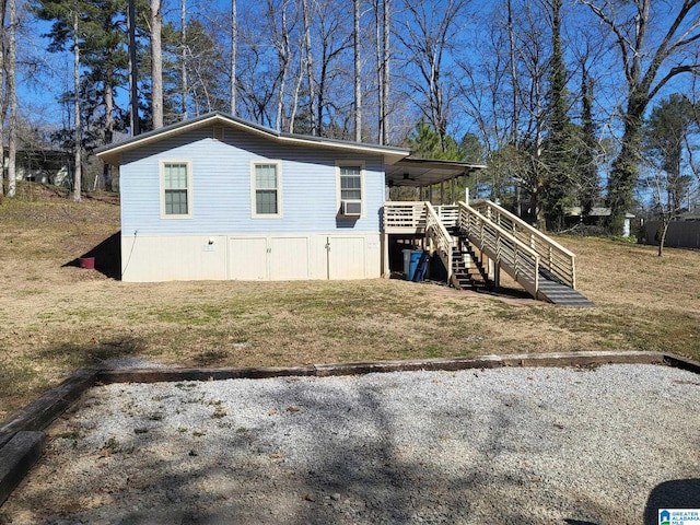 view of outbuilding with stairs