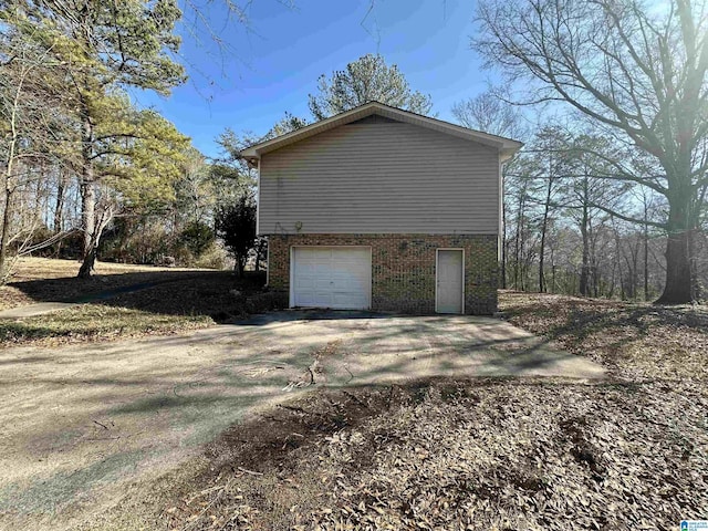 view of home's exterior with a garage