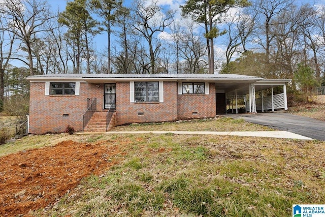 view of front facade with a carport