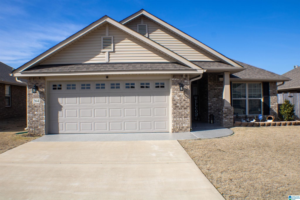 view of front of home with a garage