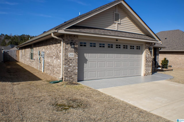 view of property exterior with a garage