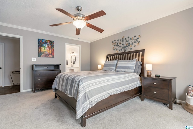 bedroom with ceiling fan, ensuite bathroom, ornamental molding, a textured ceiling, and light carpet