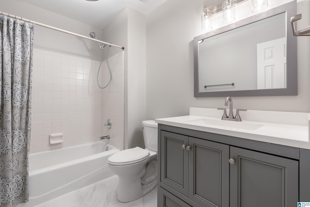 full bathroom featuring vanity, shower / bath combo with shower curtain, and toilet