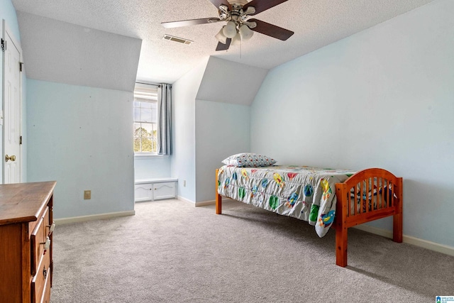 140 Russet Hill Dr, Hoover, AL 35244 - carpeted bedroom featuring a textured ceiling, lofted ceiling, baseboards, and a ceiling fan