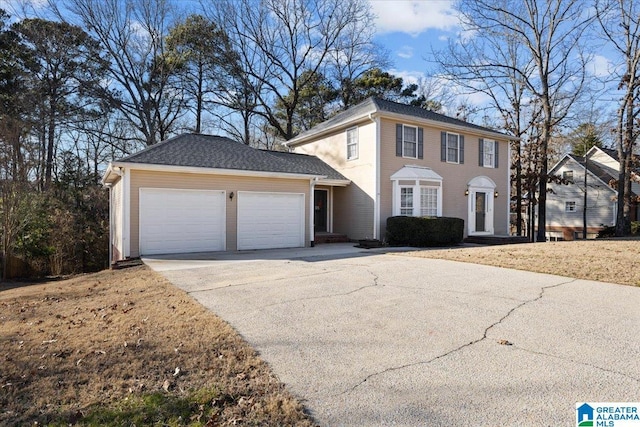 view of front of home with a garage