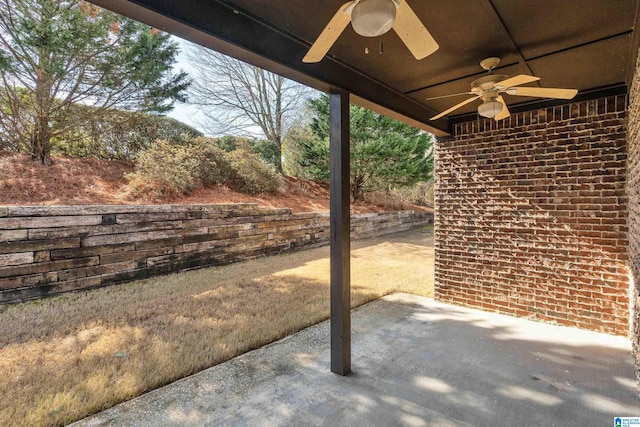 view of patio featuring ceiling fan