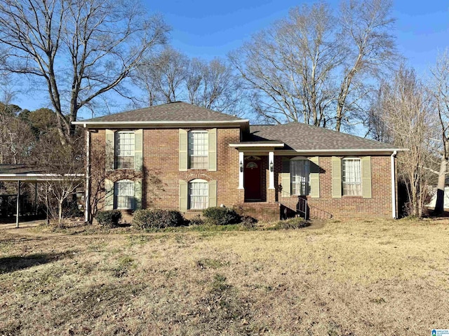 view of front facade with a front lawn