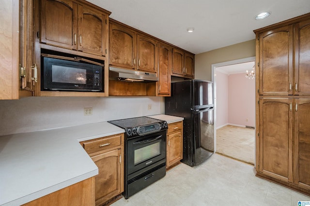 kitchen with black appliances