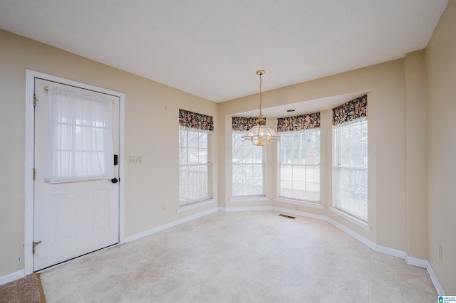 view of unfurnished dining area