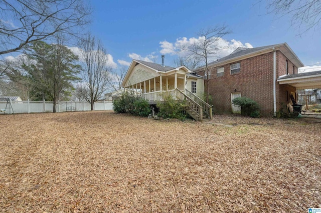 back of house with covered porch