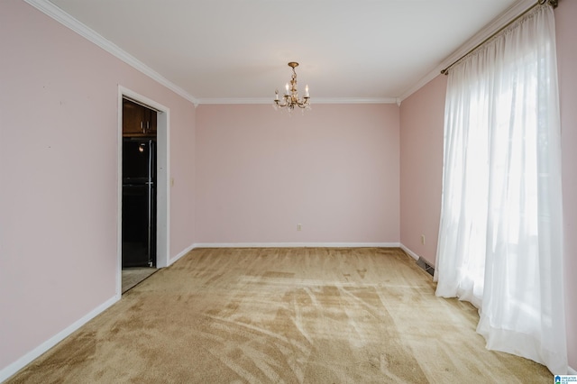 carpeted empty room featuring a notable chandelier and crown molding