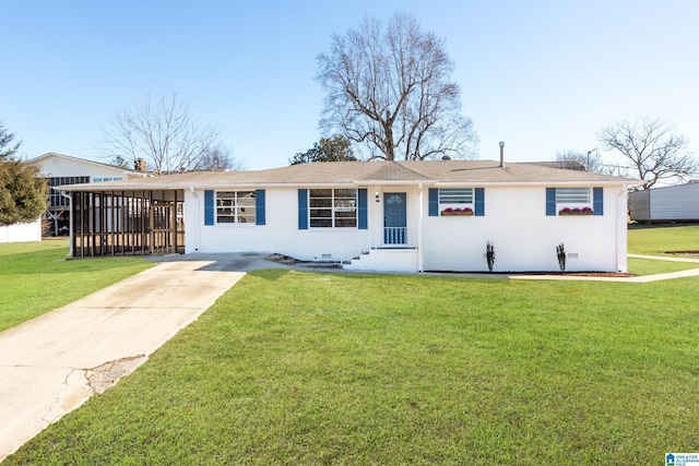 ranch-style house with a carport and a front yard