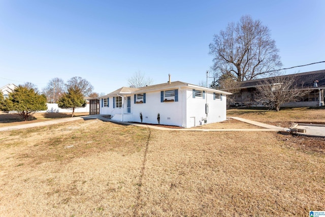 exterior space with a front lawn