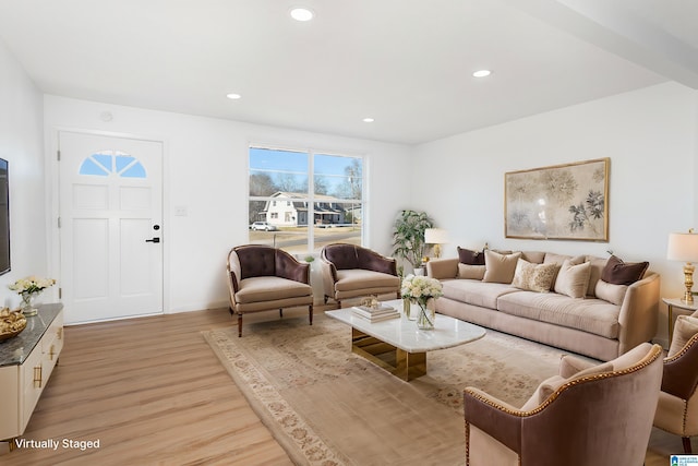 living room with light hardwood / wood-style flooring