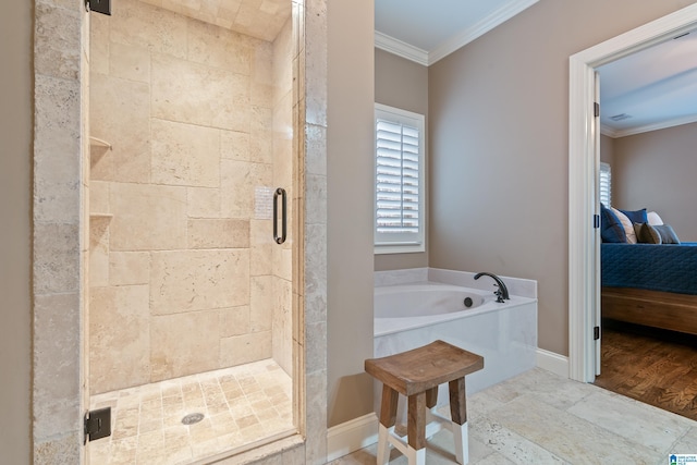 bathroom featuring crown molding and plus walk in shower