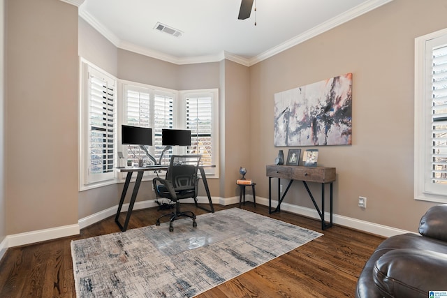 office space featuring ornamental molding, dark wood-type flooring, and ceiling fan